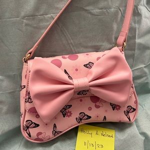 Disney Her Universe Minnie Bow shoulder bag.